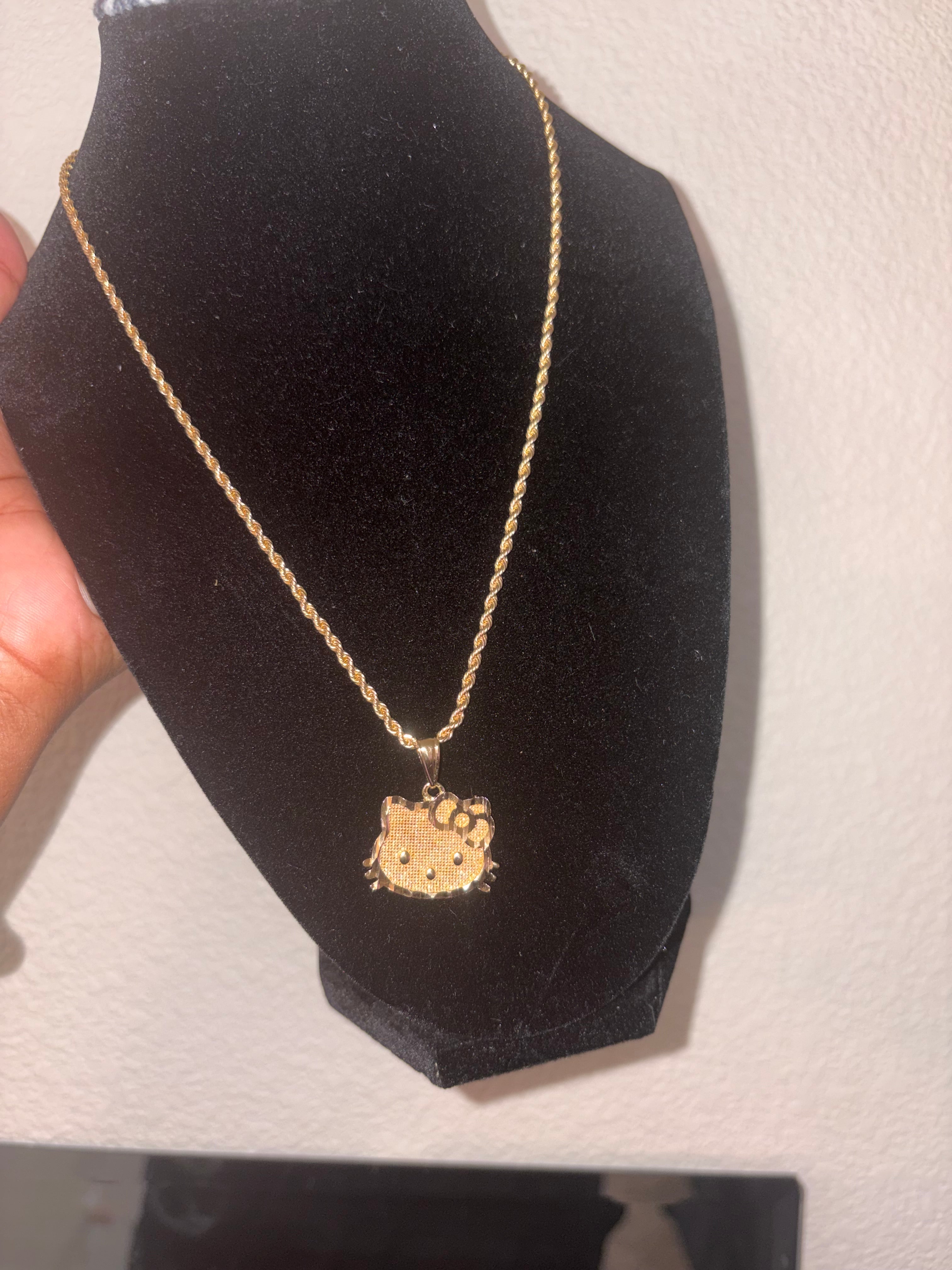HK face necklace